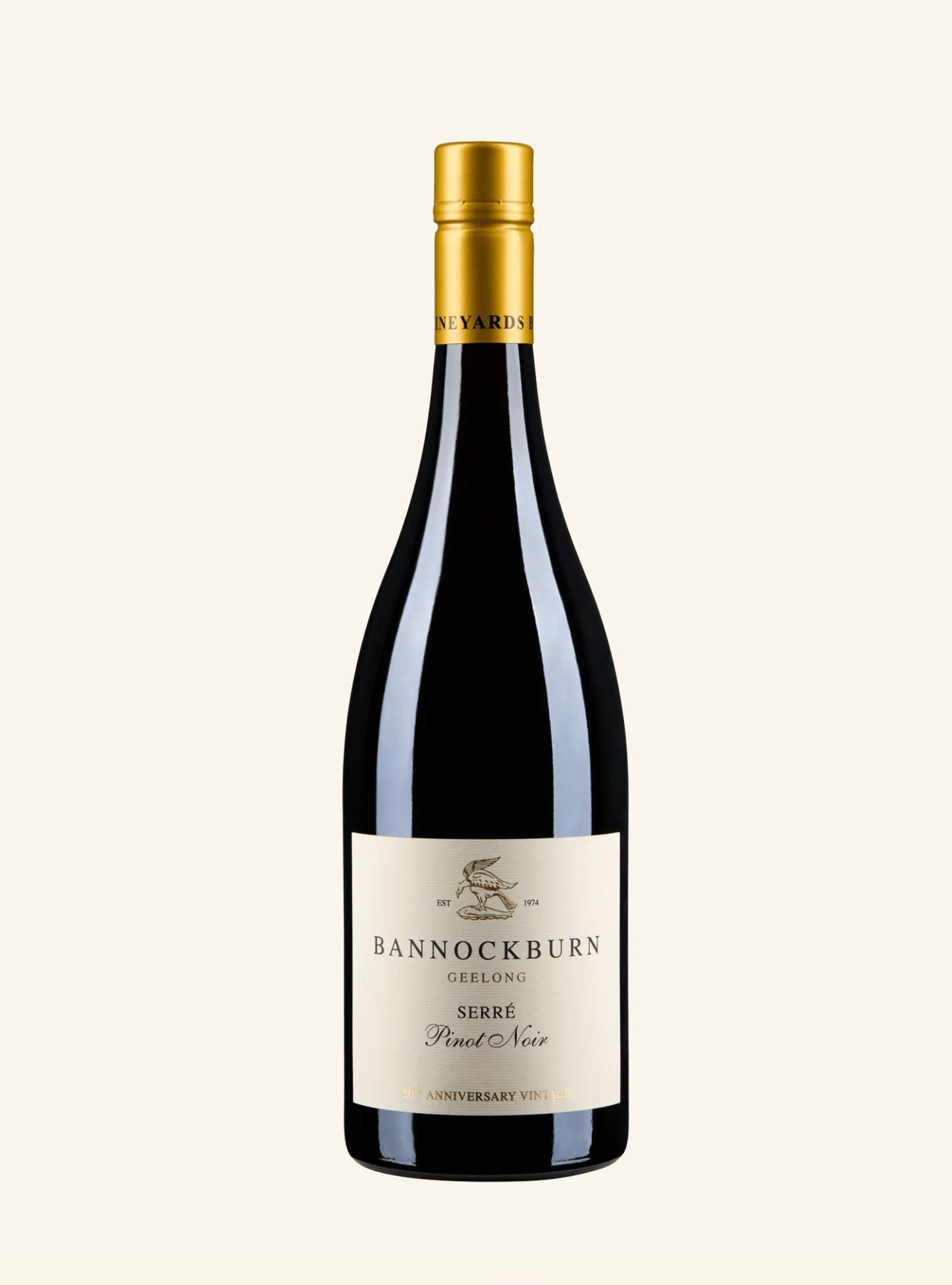 A bottle of Bannockburn Serre Pinot Noir red wine, featuring a dark glass bottle with a gold foil capsule and a cream-colored label, set against a solid off-white background.
