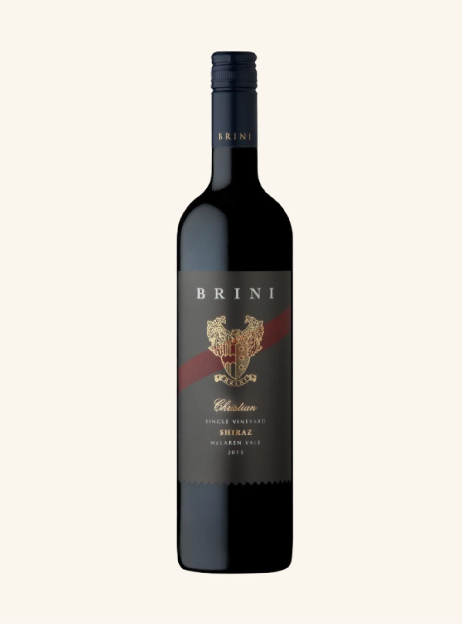 A dark coloured wine bottle with a dark grey label and a gold logo 