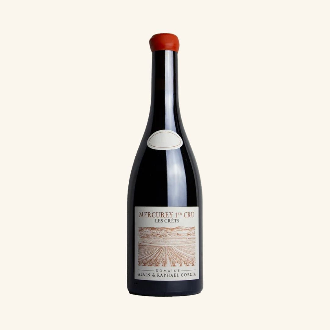 Wine bottle with a label branded mercurey 1er cru les crets by domaine alain & Raphael corcia, on a white background