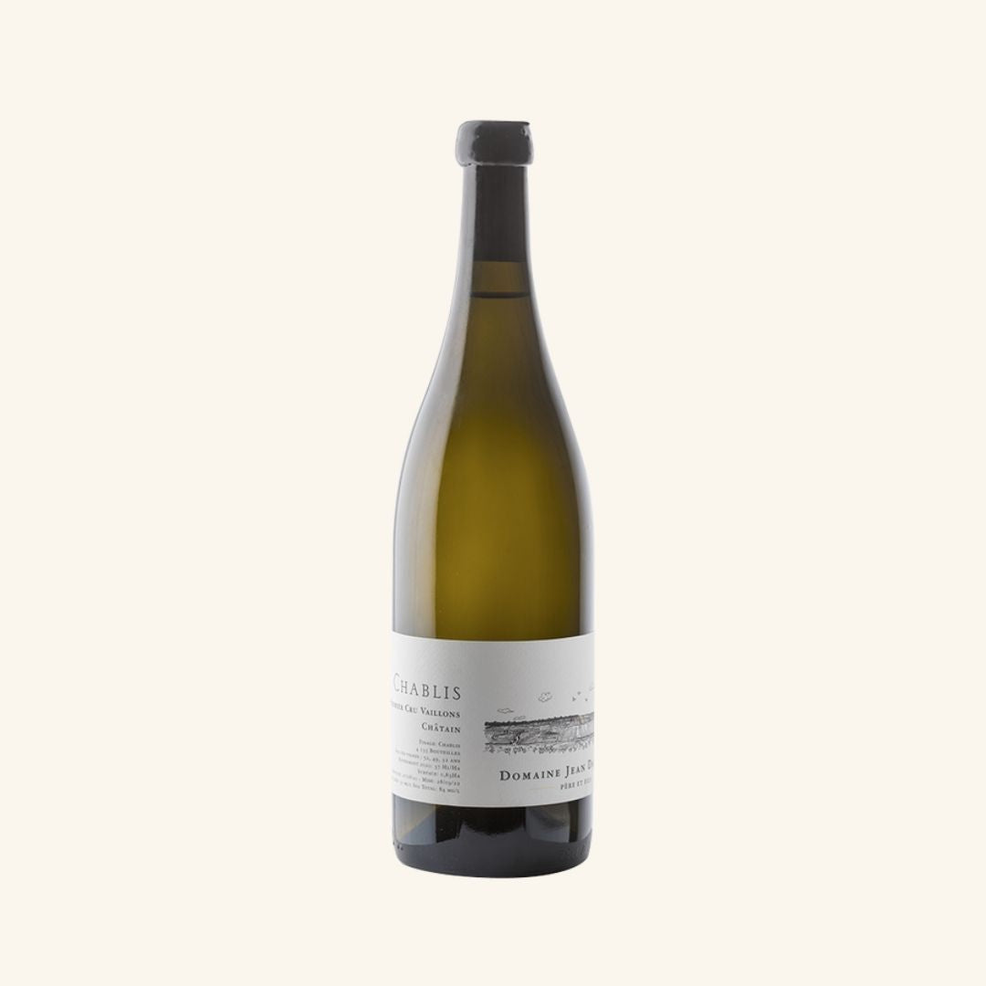 Wine bottle with a labeled chablis vaillons by jean dauvissat on a white background