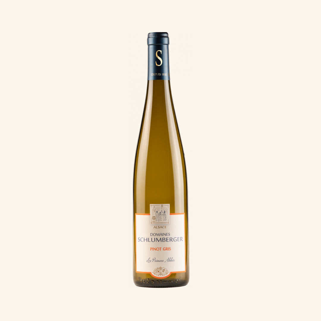 Bottle of Domaine Schlumberger Les Princes Abbés Pinot Gris wine with a label that includes the wine variety and the word 'AOC' denoting its protected designation of origin.