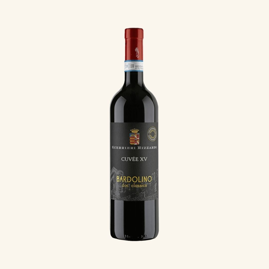 Red wine bottle with a visible label branded cuvee XV Bardolino DOC Classico on a white background