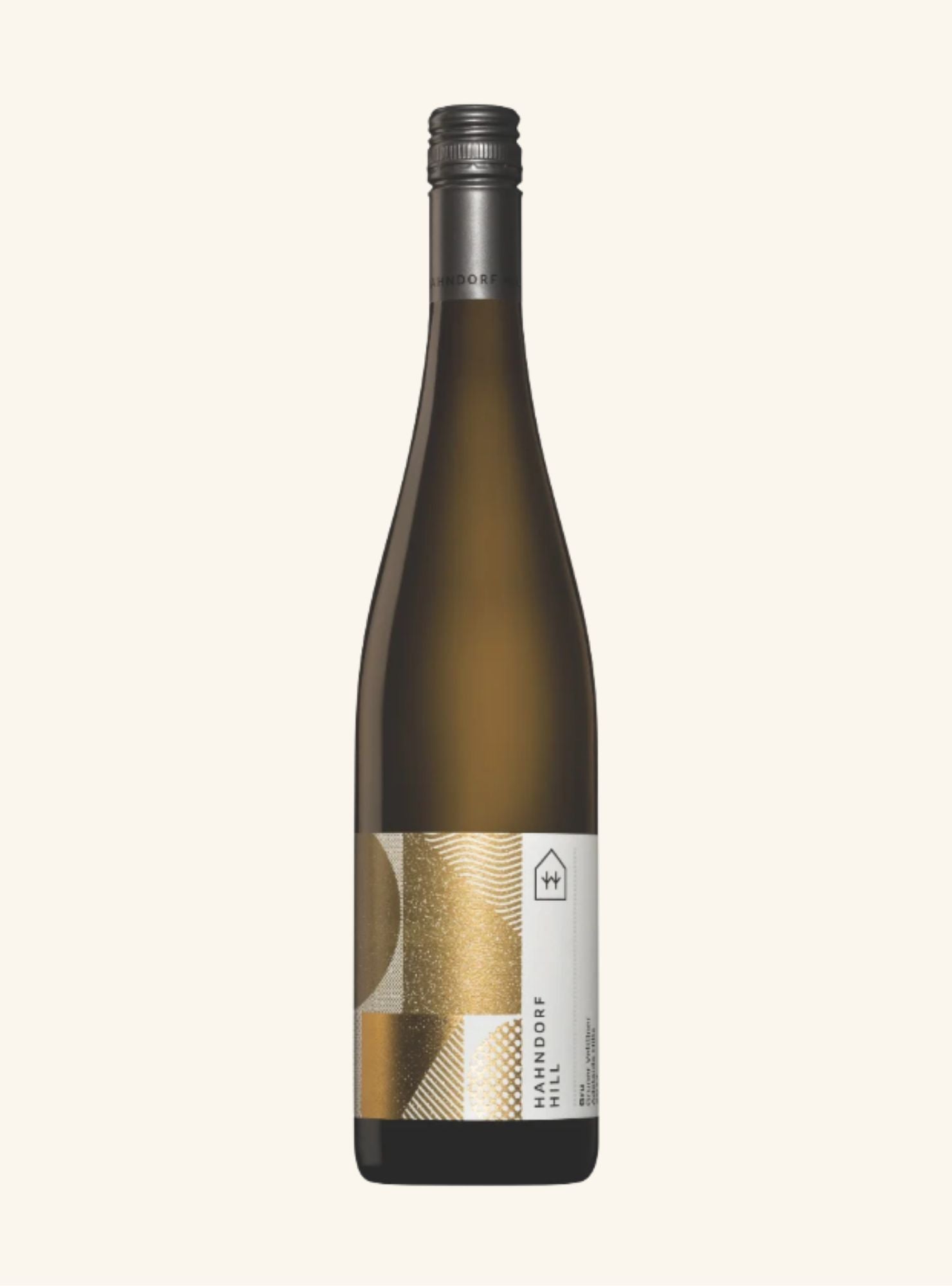 Dark amber coloured wine bottle with a gold and white label, set on an off-white background. 
