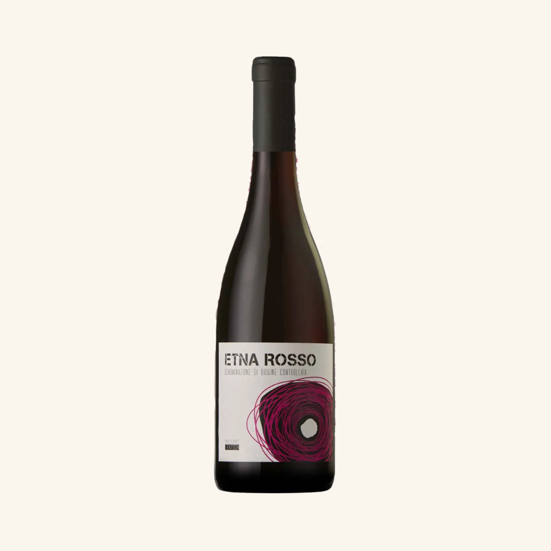 A bottle of Idda Etna Rosso wine with a label showing the name of the wine and the grape variety 'Nerello Mascalese'.