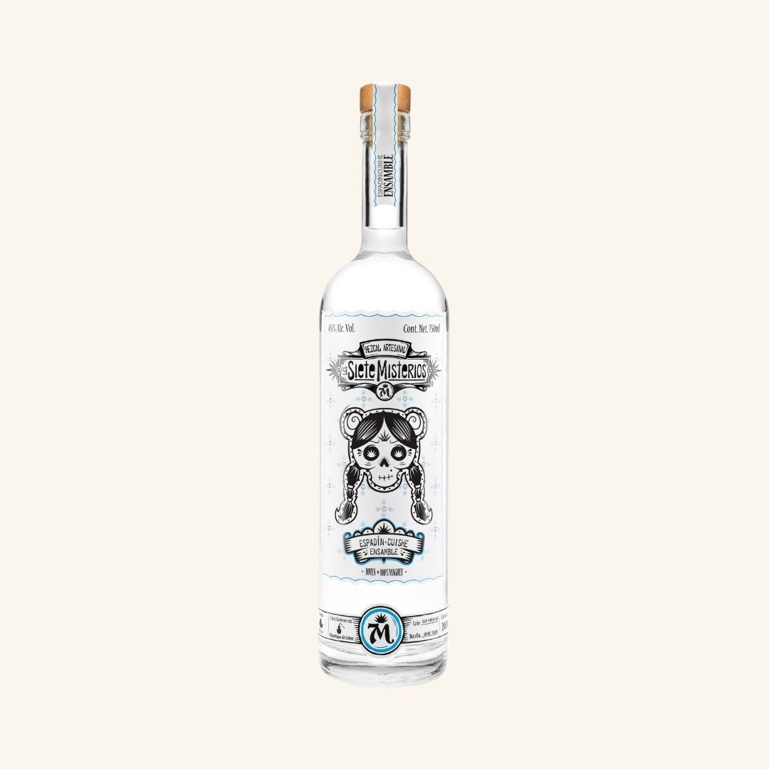 Bottle of siete misterios cuishe mezcal on a white background