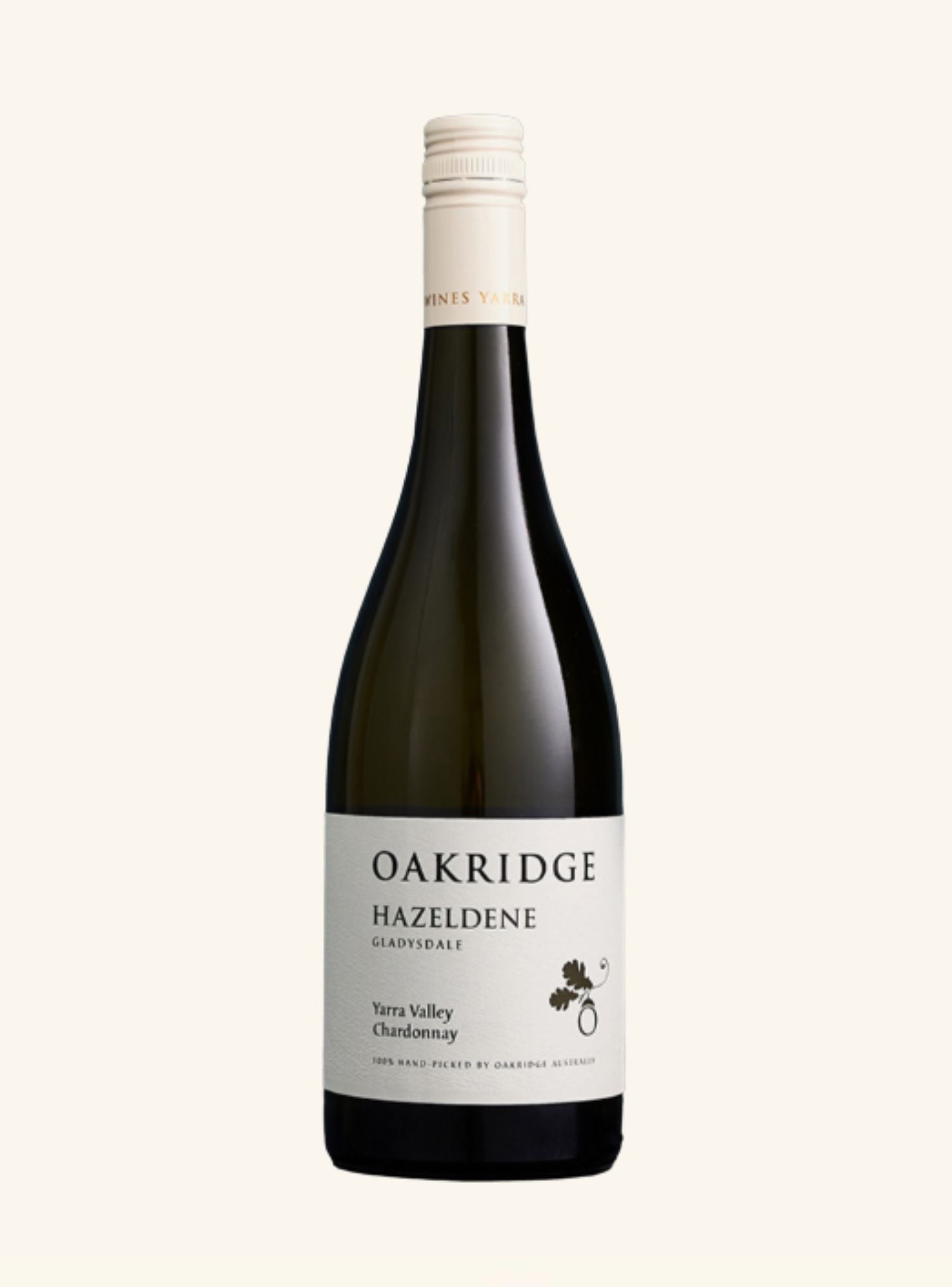 A bottle of Oakridge Hazeldene Chardonnay from the Terra Valley, featuring a dark glass bottle with a white label and a cream-colored foil top, set against a solid off-white background.