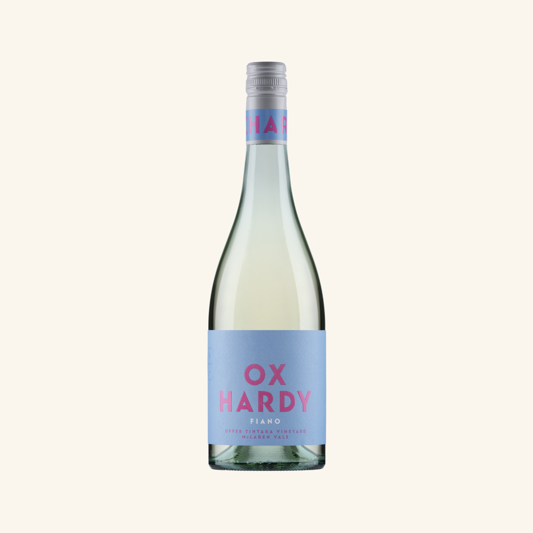 A bottle of Ox Hardy Fiano white wine with a blue and pink label, textured background, and no visible branding on the bottle.