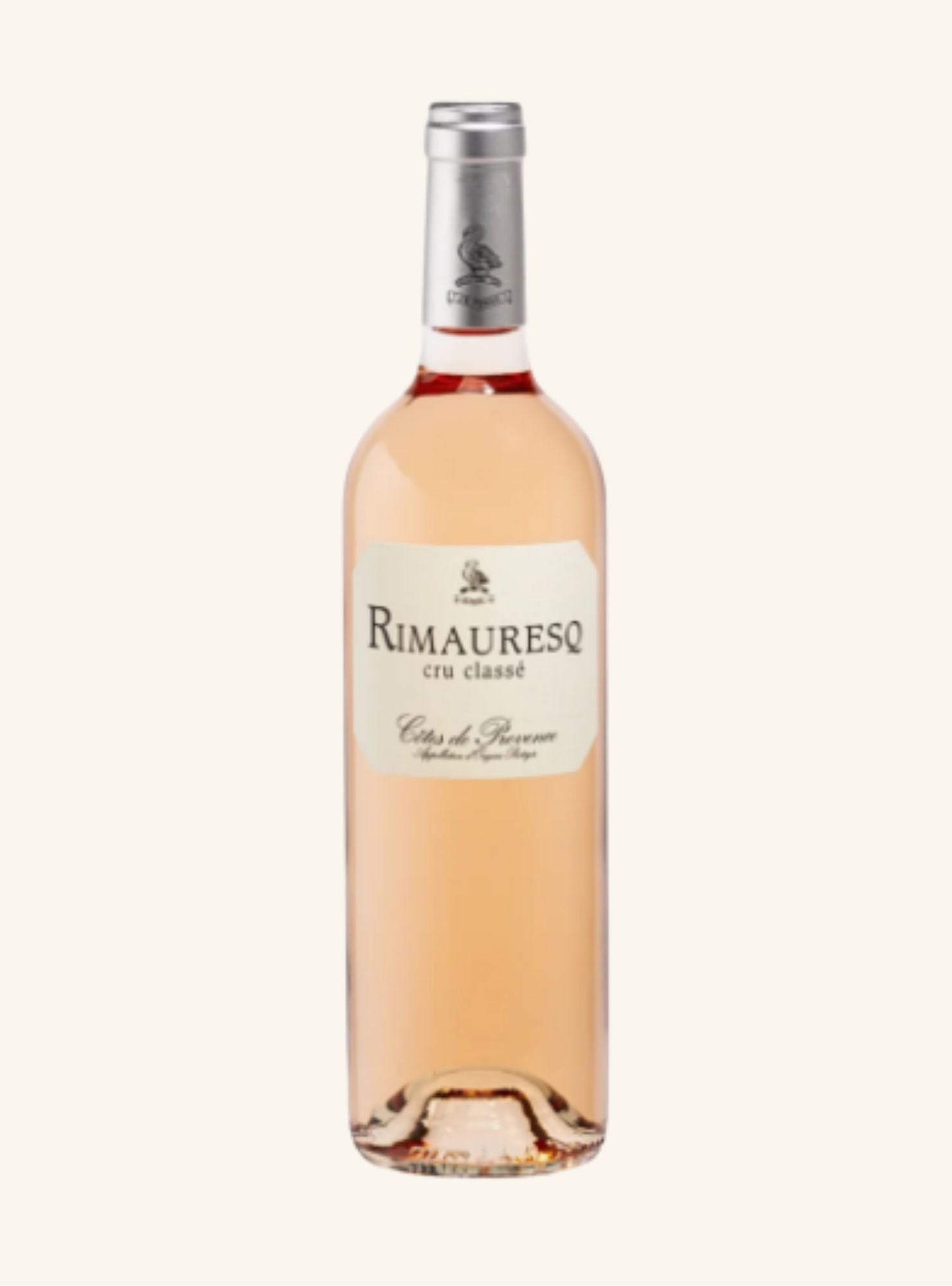 Peach coloured wine bottle with a pale yellow label with black writing set on an off white backgound. 