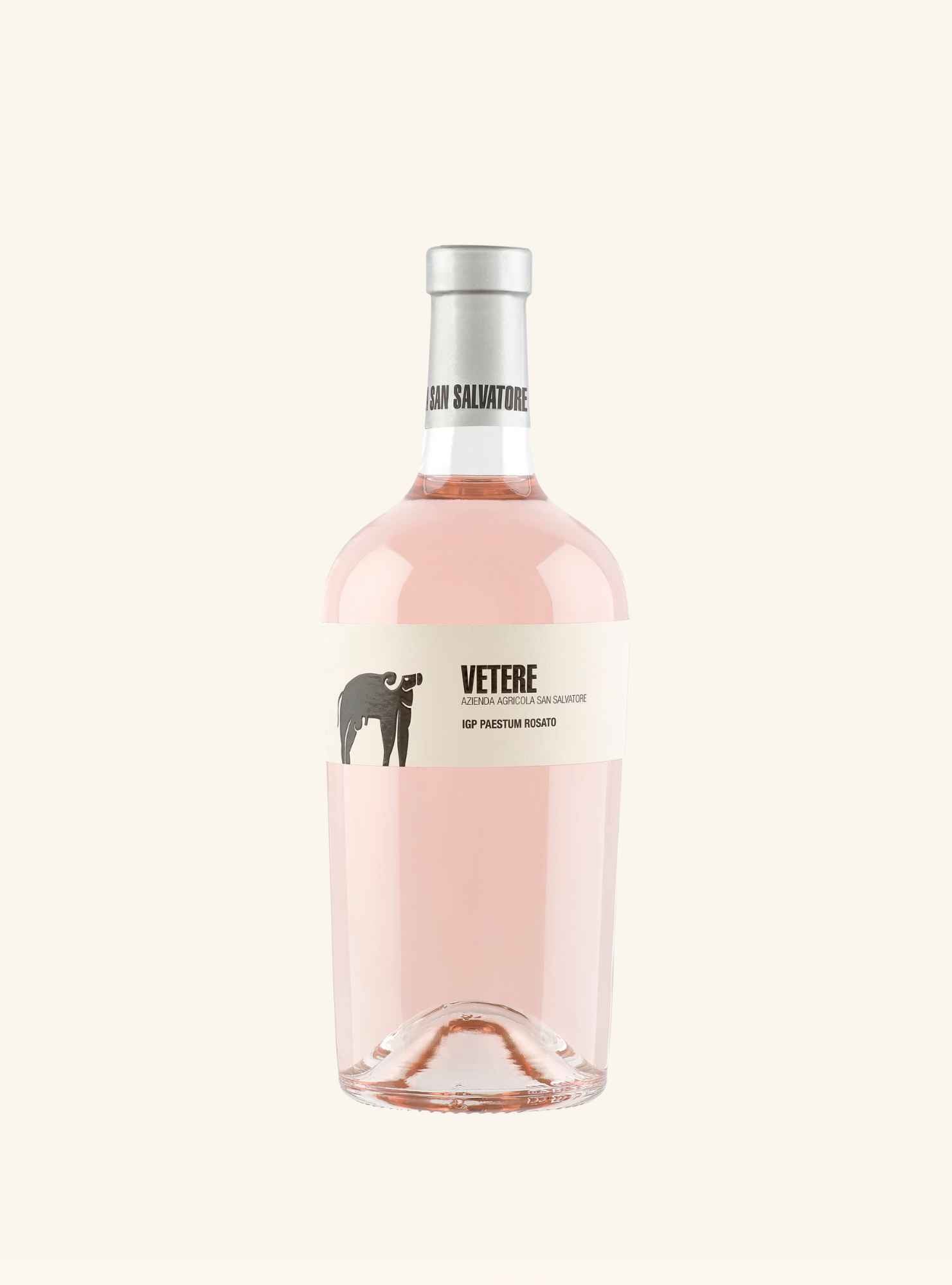 A bottle of VETERE non-treated rosé wine with a pale pink liquid, featuring a white label with a black bear logo and a silver foil neck seal, set against a solid off-white background.