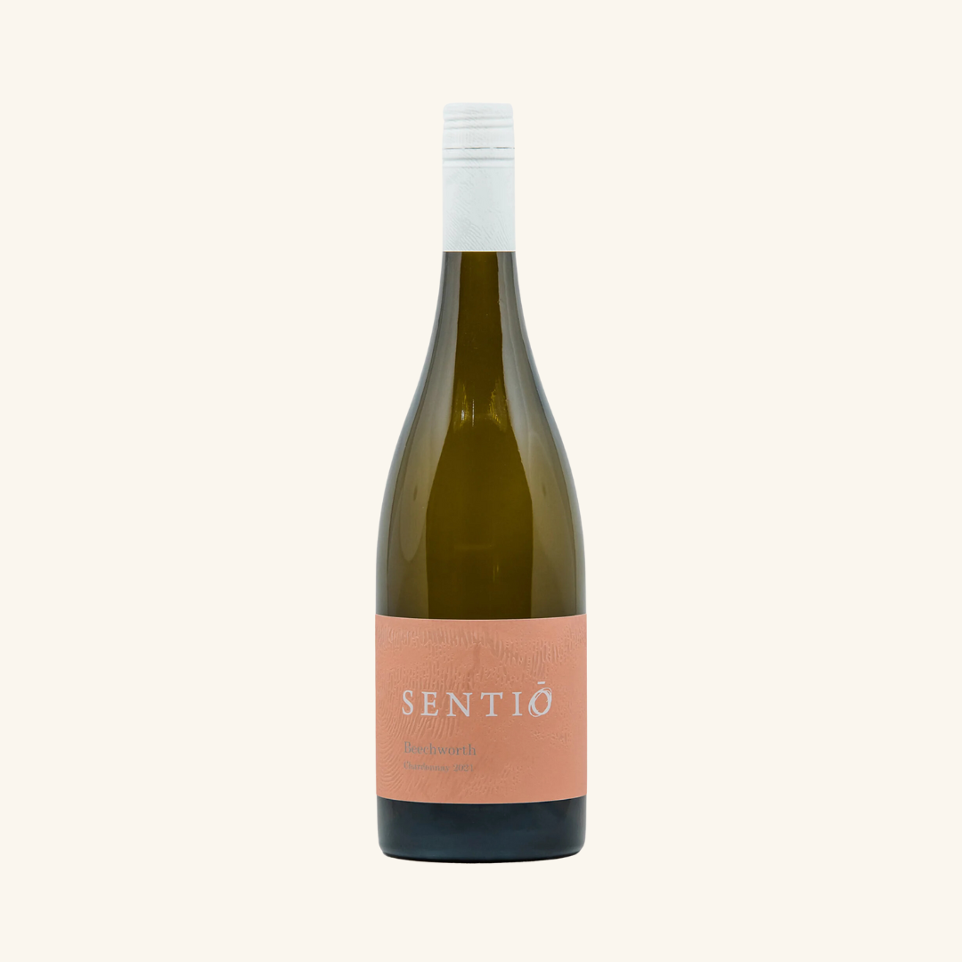 Bottle of Sentio Beechworth Chardonnay wine with a light pink clay label and white text.