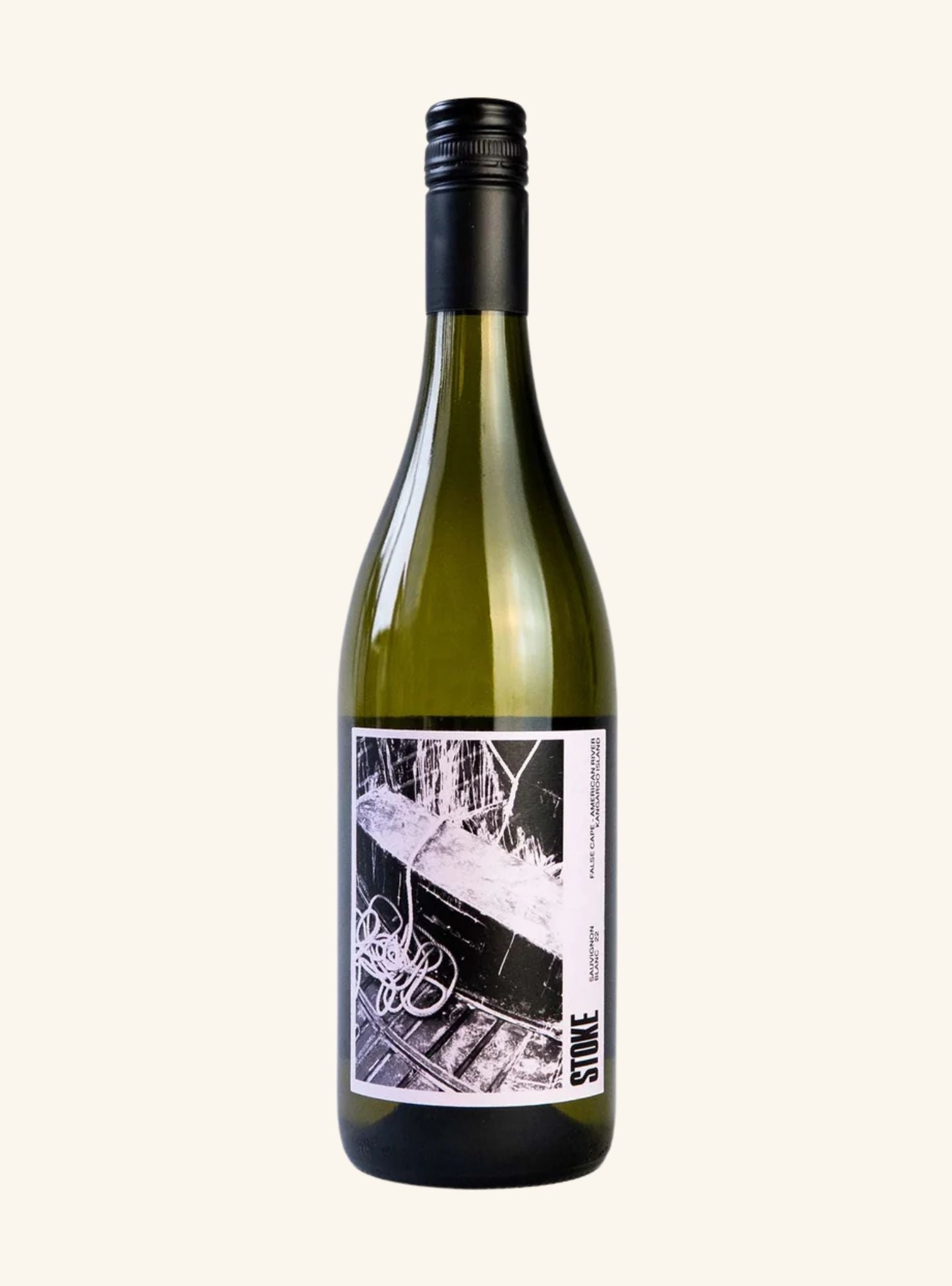 A bottle of Stone Cellar Sauvignon Blanc with a black screw cap and a black-and-white label featuring a ship illustration, set against a solid off-white background.
