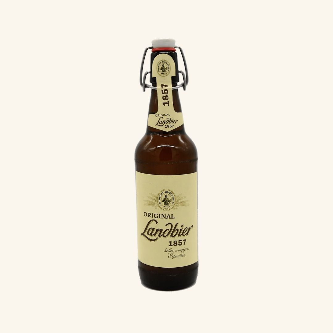 Brown bottle of Original Landbier 1857 on a white background