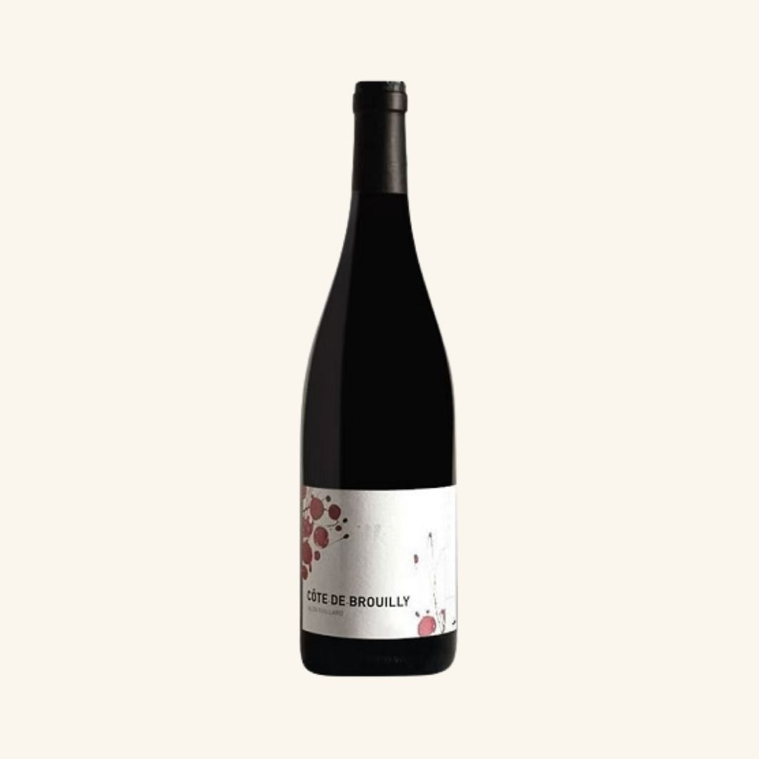 Wine bottle with a label branded cote de brouilly alex foillard on a white background