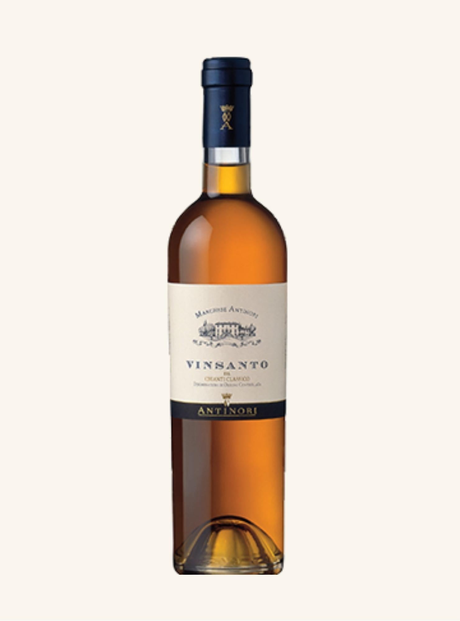 Bottle of Vinsanto wine by antinori with a white label on a light beige background