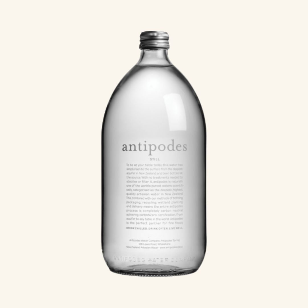Clear bottle with 'antipodes' branding on a white background