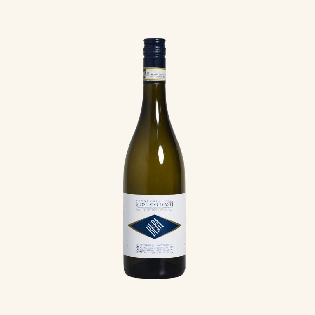 Bottle of white wine with a blue label on a white background