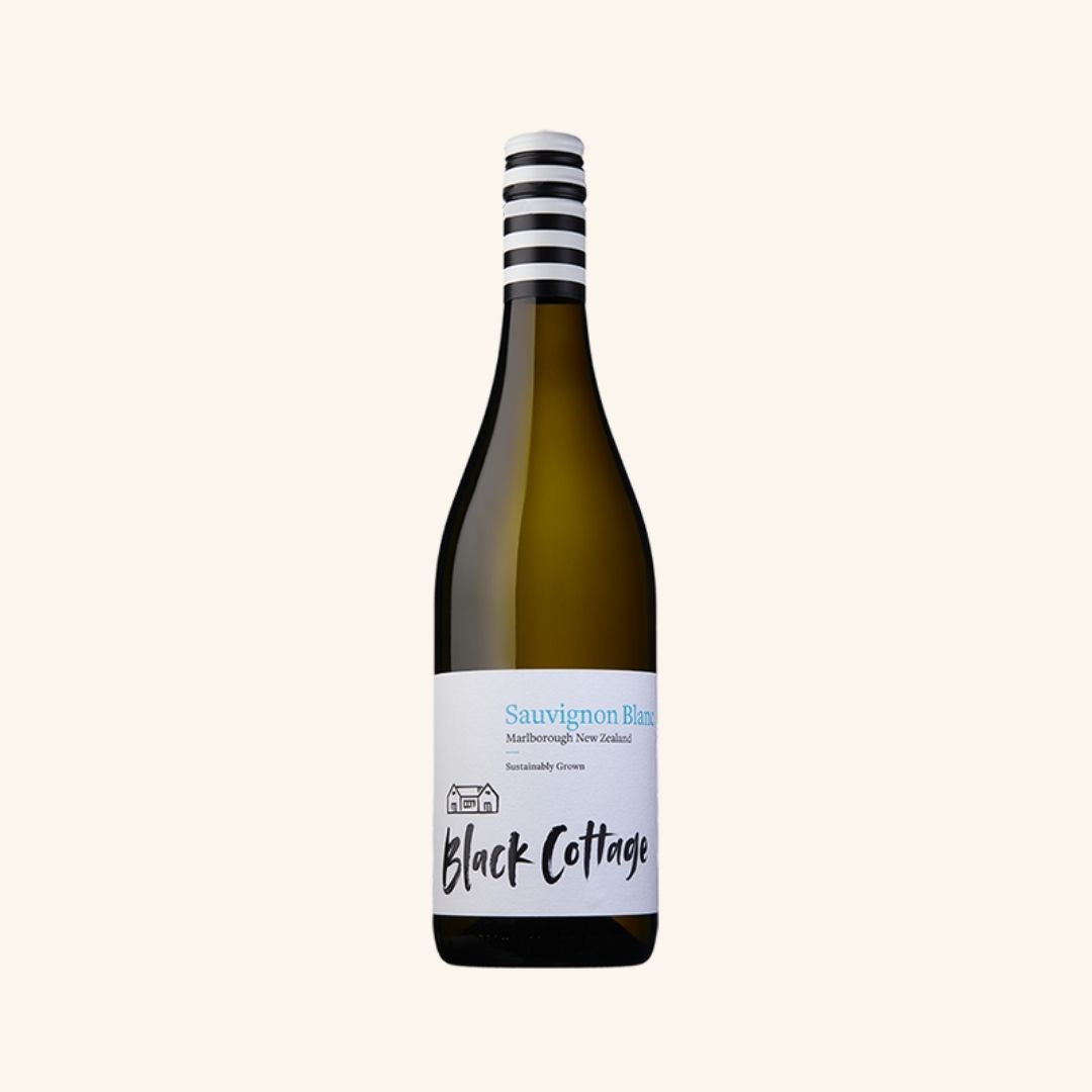 Wine bottle with 'Black Cottage sauvignon blanc' label on a white background