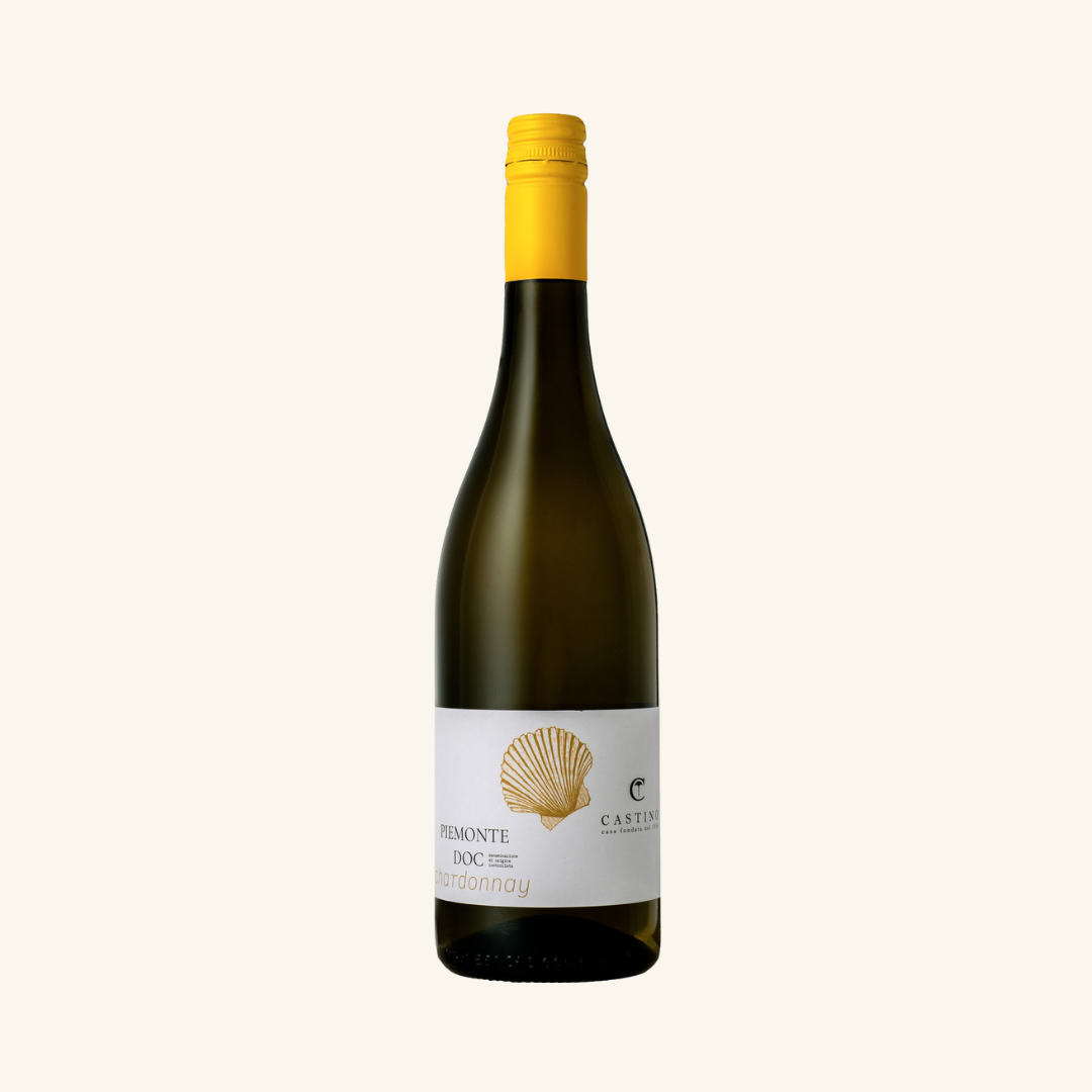 A bottle of Castino DOC Chardonnay wine with a white label and a yellow cap.
