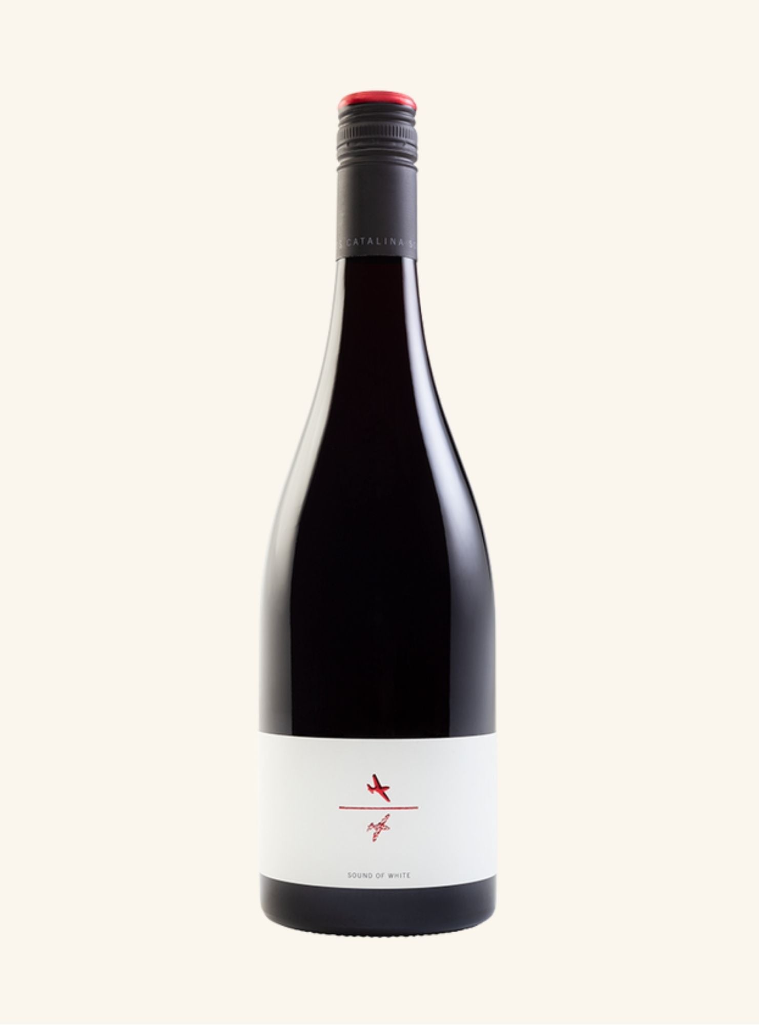 Wine bottle with a white label branded sound of white on a white background