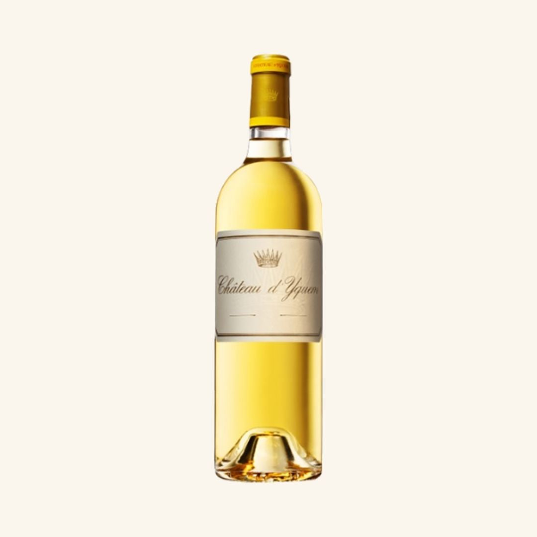Bottle of Château d'Yquem wine on a white background
