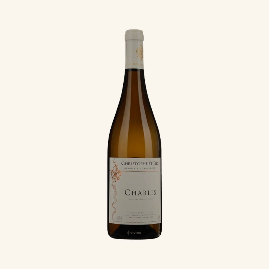 Bottle of Christophe et fils Chablis wine on a white background