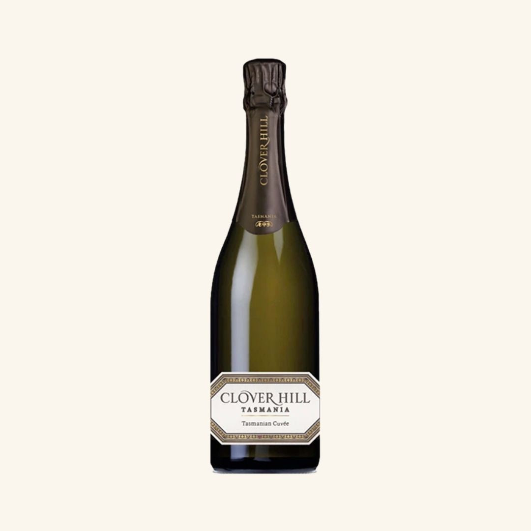 sparkling wine bottle braned clover hill tasmania cuvee on a white background.