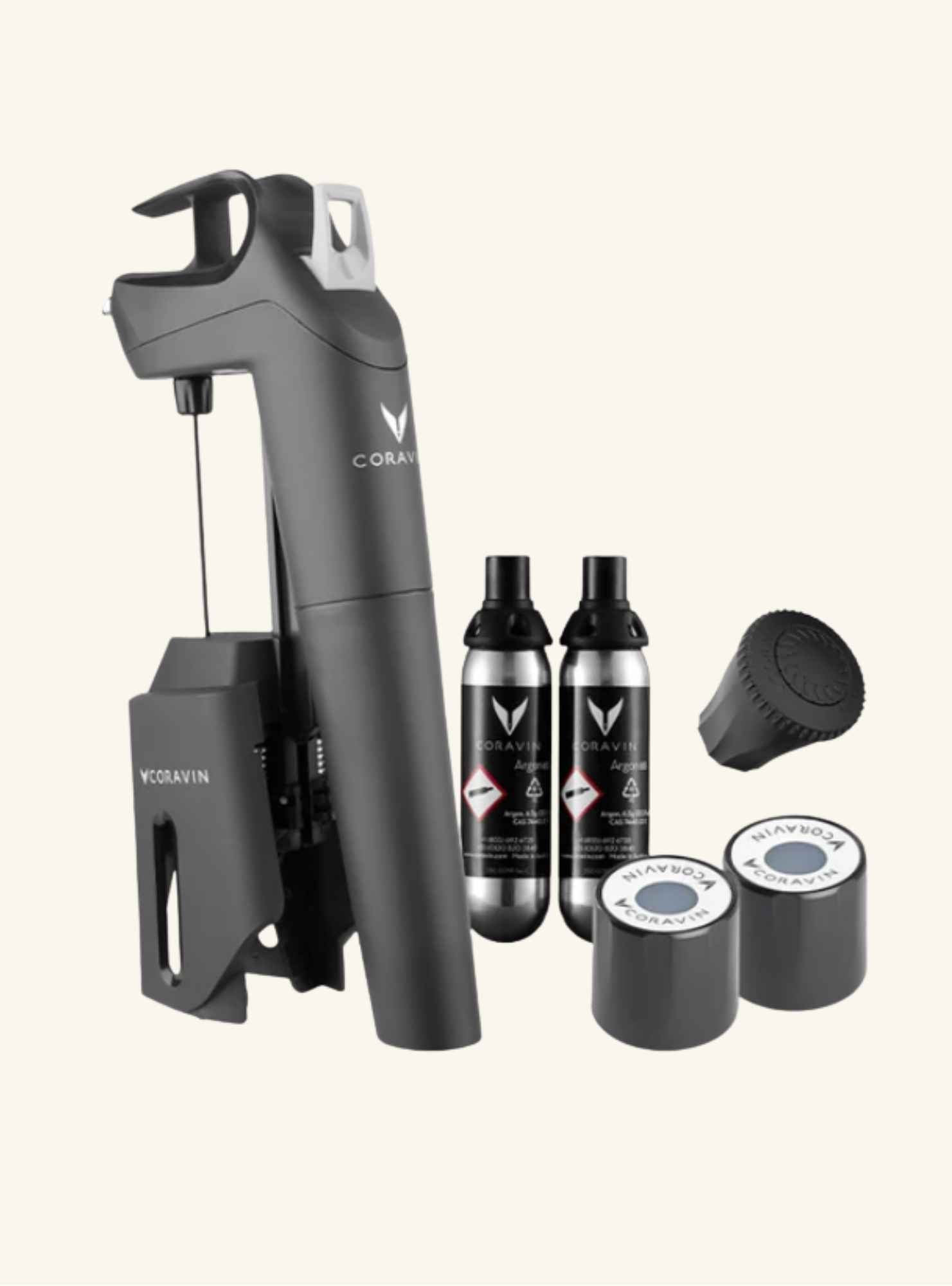 Coravin timeless 3 wine preservation system with 2 gas capsules, 2 screwcaps and an aerator on a white background.
