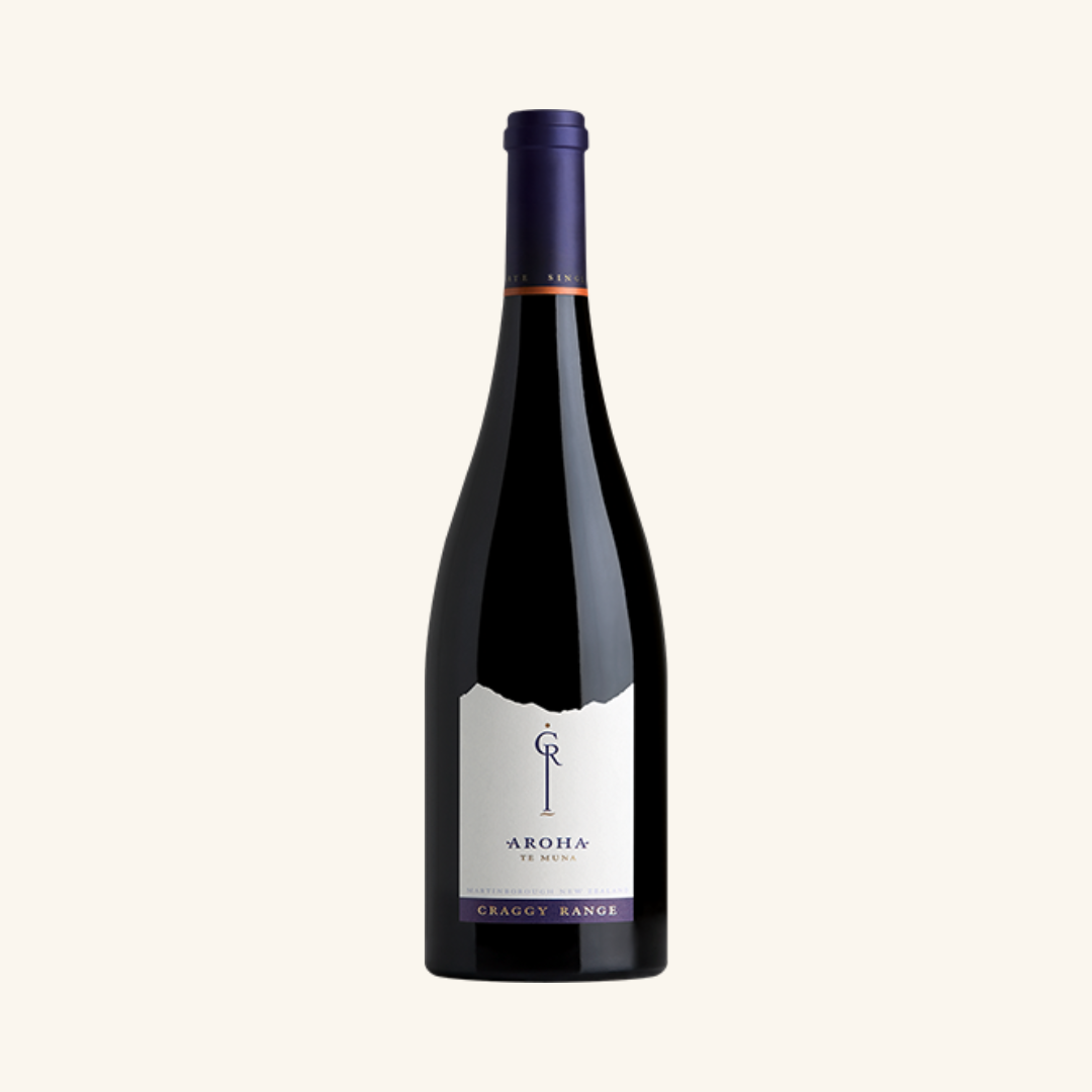 A bottle of Craggy Range Aroha Te Muna Pinot Noir wine with a label that includes the name of the wine and the region it was produced in, Martinborough NZ.