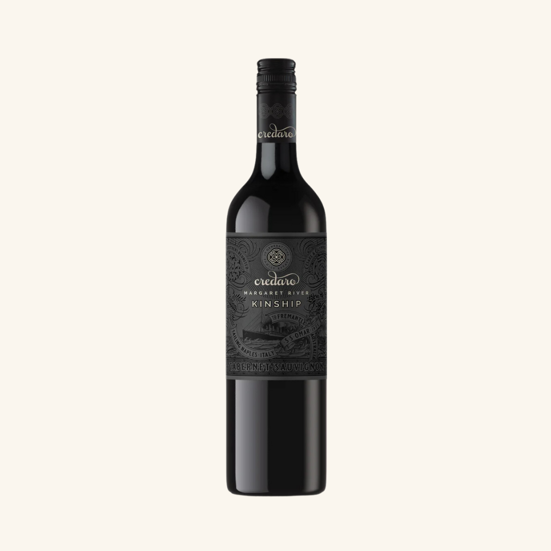 A bottle of Credaro Kinship Cabernet Sauvignon wine with a dark label on a white background.