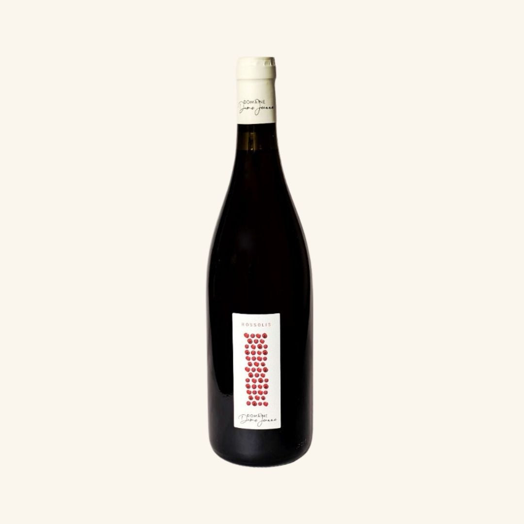 Wine bottle with a label branded domaine dame jeanne Rossolis on a white background