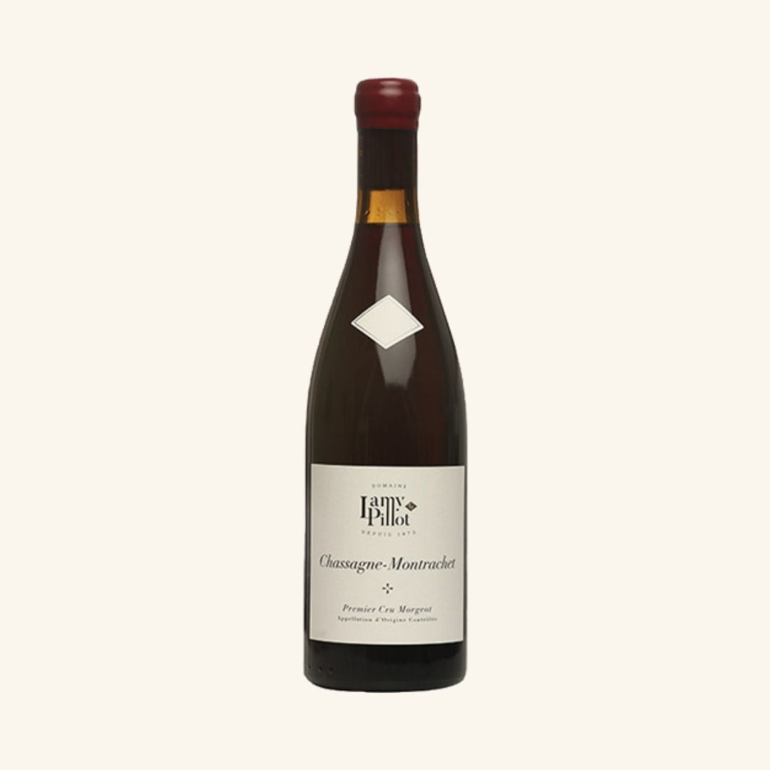 Wine bottle with a label brand Lamy-Pillot chassagne-montrachet premier cru morgeot on a white background