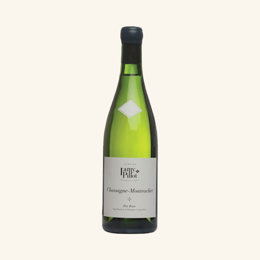 Wine bottle with a label branded lamy-pillot chassagne-montrachet pot bois on a white background