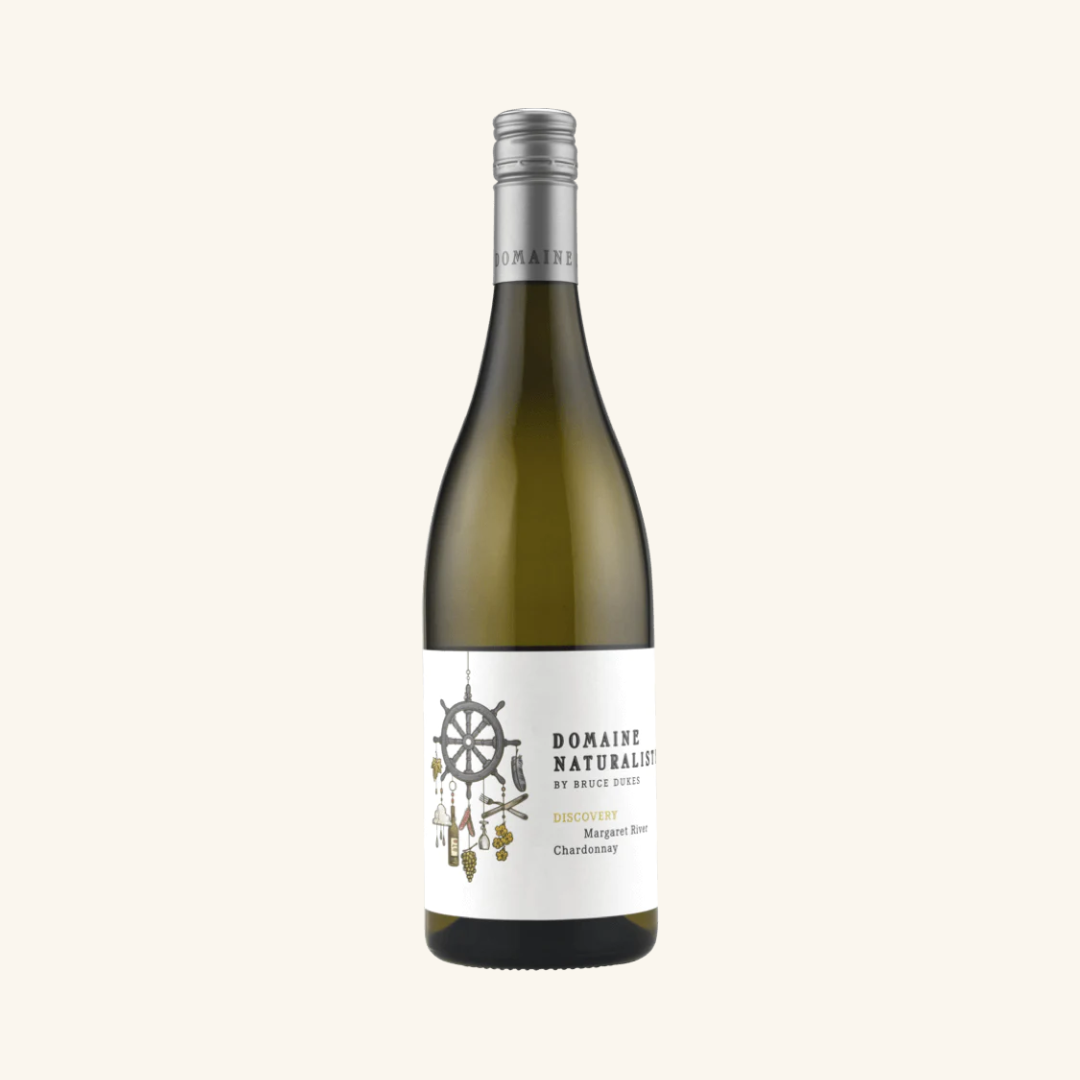 Bottle of Domaine Naturaliste Discovery Chardonnay white wine with a label featuring a compass and text.