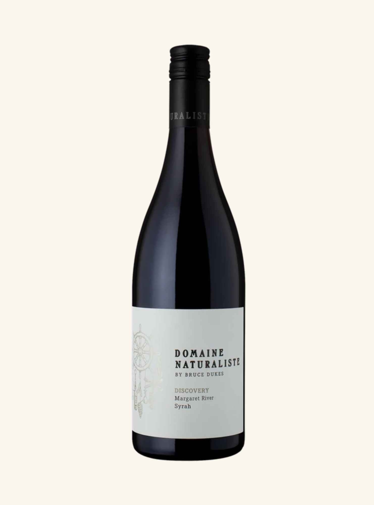 A bottle of Domaine Naturaliste by Bruce Dukes Discovery Margaret Syrah red wine, featuring a dark glass bottle with a black capsule and a white label, set against a solid off-white background.