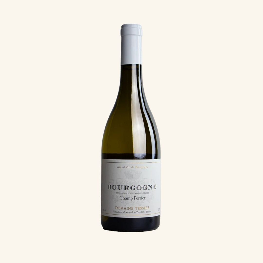 Bottle of white Bourgogne wine from Domaine Tessier with a white label on a light beige background