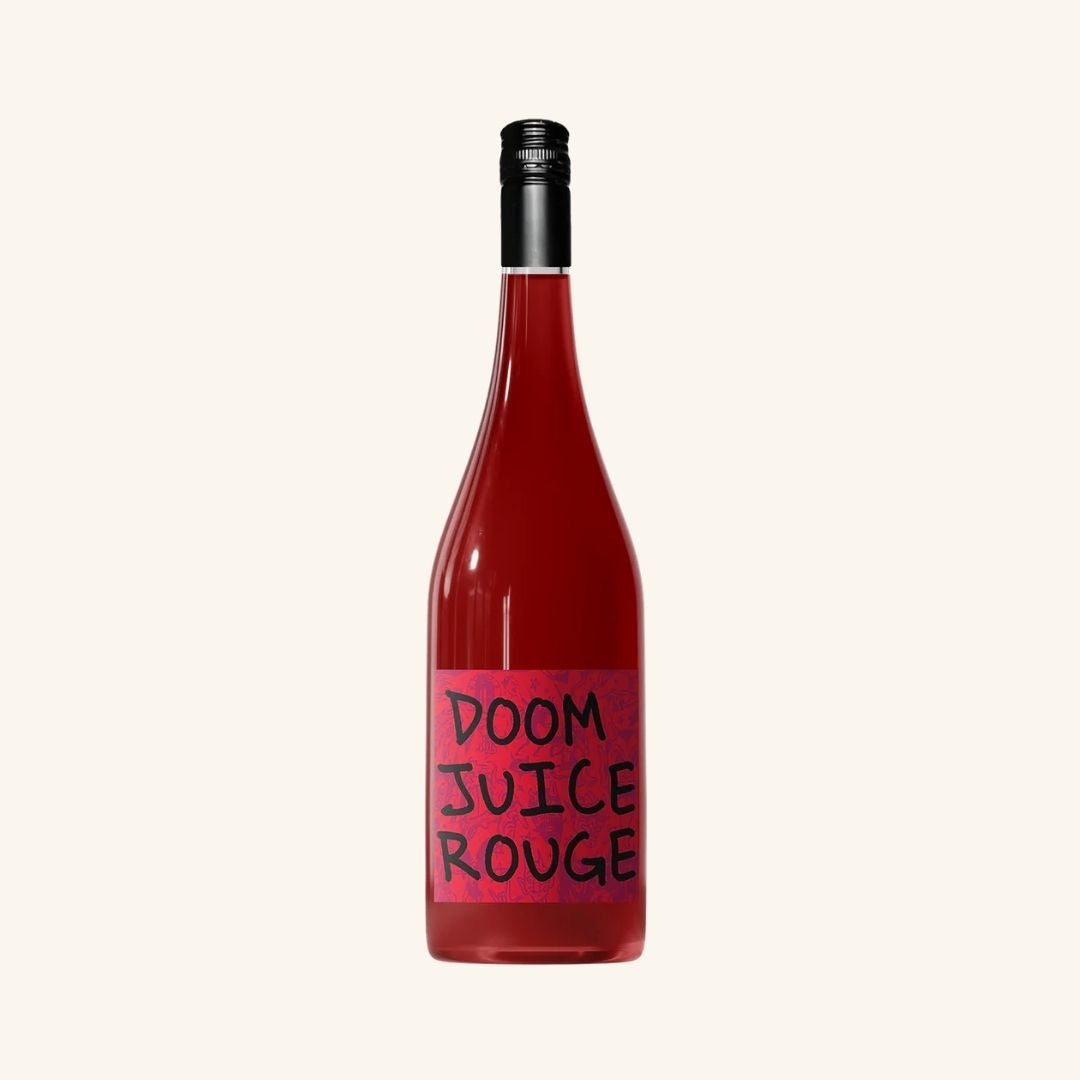Bottle of Doom Juice Rouge wine on a white background