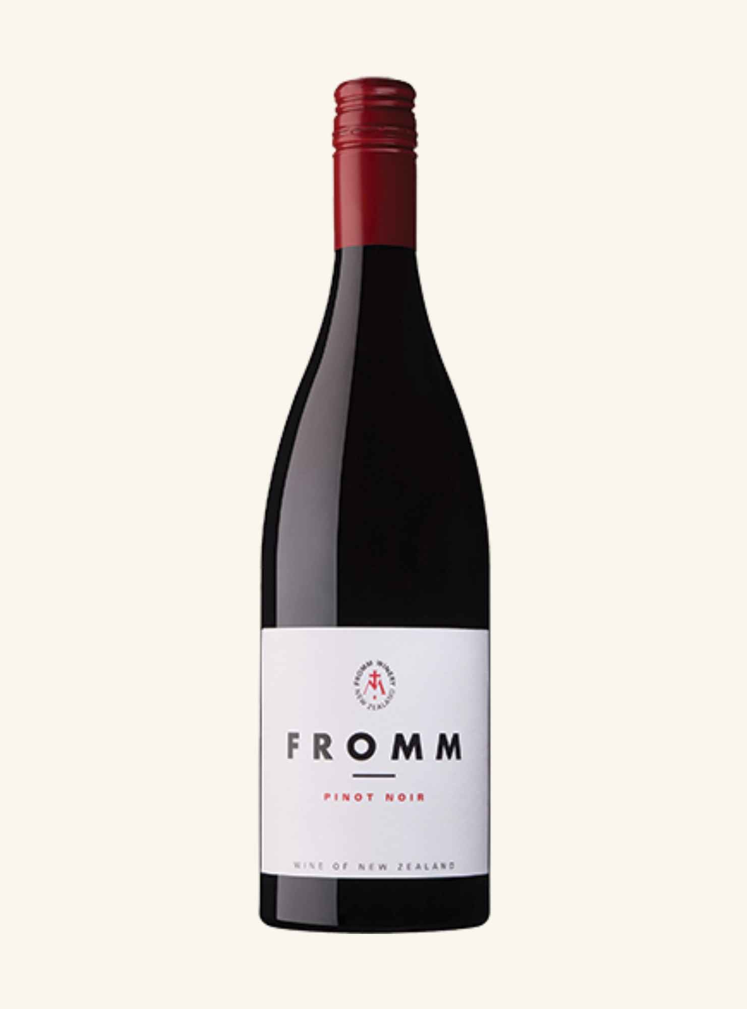 A bottle of Fromm Pinot Noir red wine with a dark glass body, a white label, and a dark red foil capsule, centered on a light cream background.
