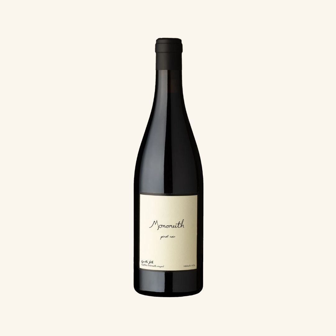 Wine bottle with a visible label branded monomeith pinot noir gentle folk on a white background
