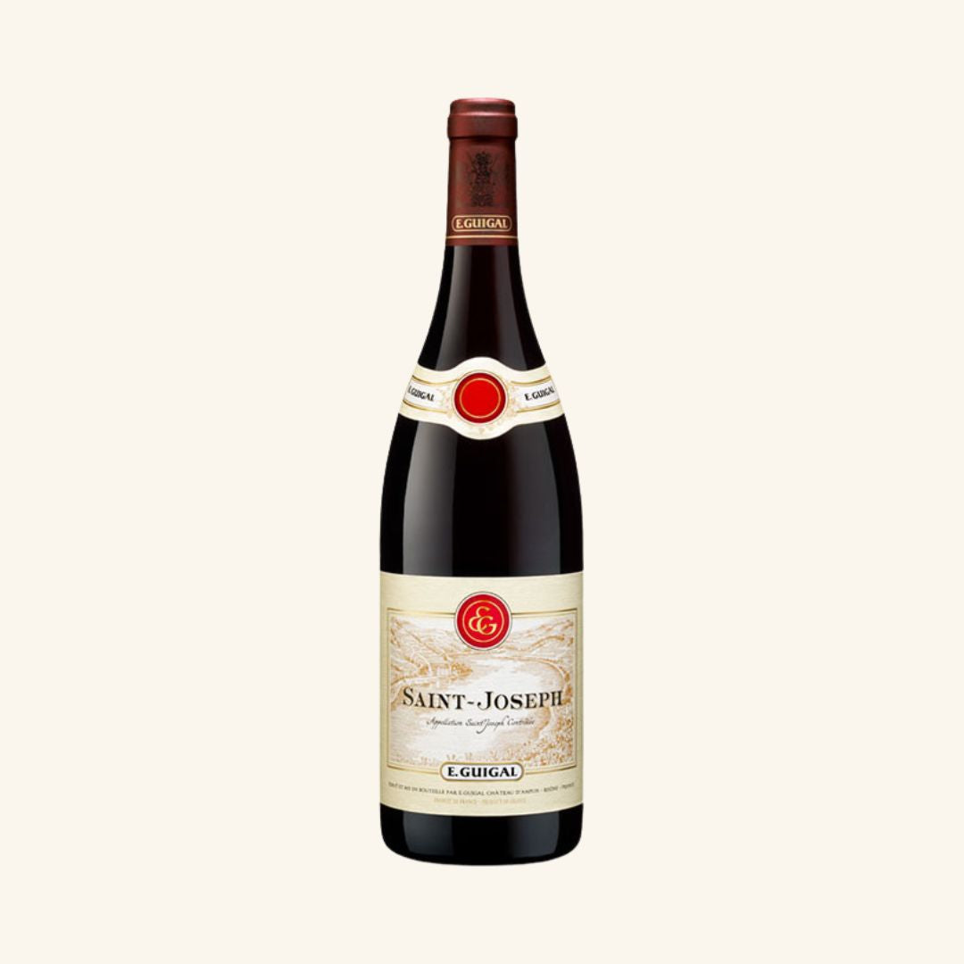 A bottle of E. Guigal St-Joseph Rouge  wine with a label showcasing the brand and the product name, set against a plain background.