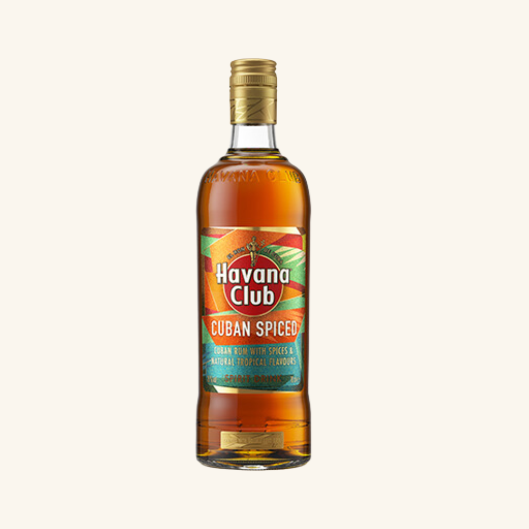 A bottle of Havana Club Cuban Spiced rum with a label showing a colorful graphic of a tropical scene.
