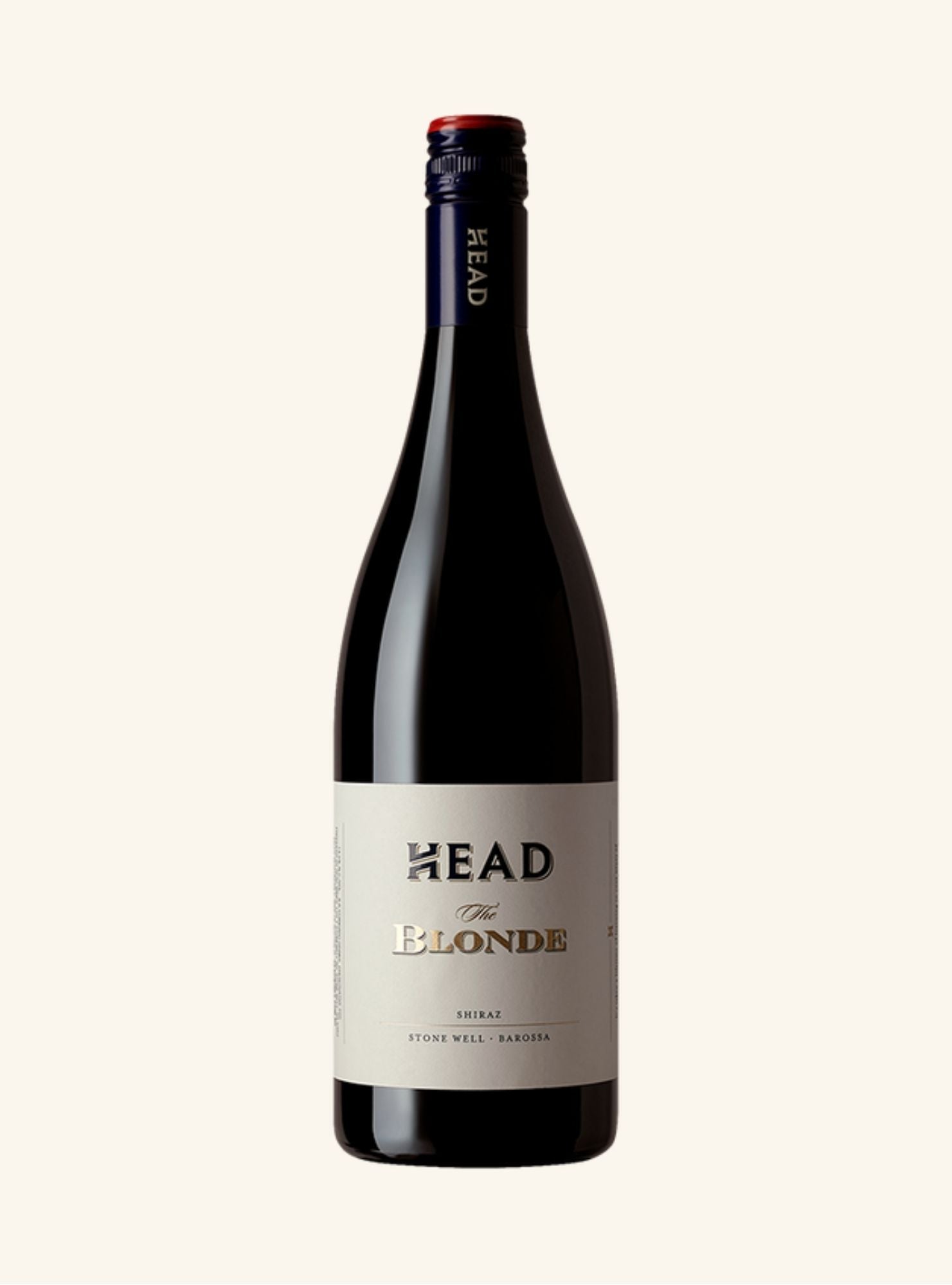 Wine bottle labeled 'HEAD The Blonde' on a white background