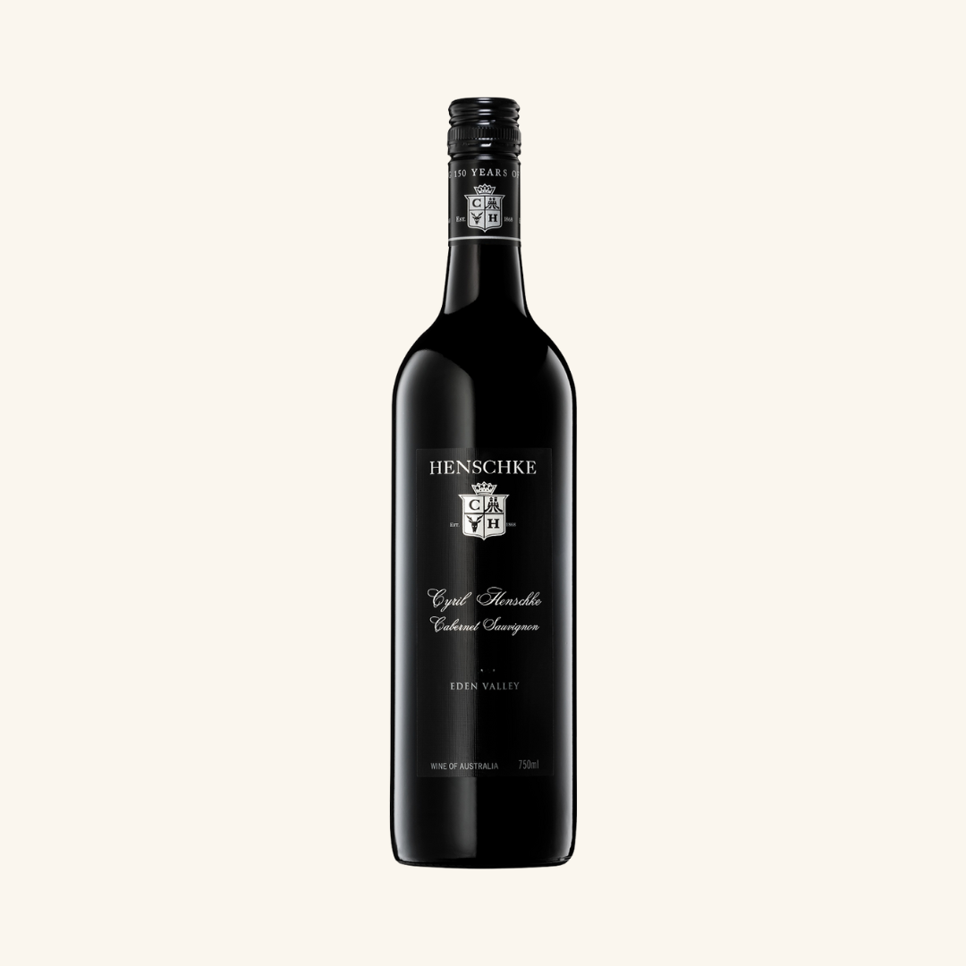 A bottle of Henschke Cyril Henschke Cabernet Blend red wine with a dark label.