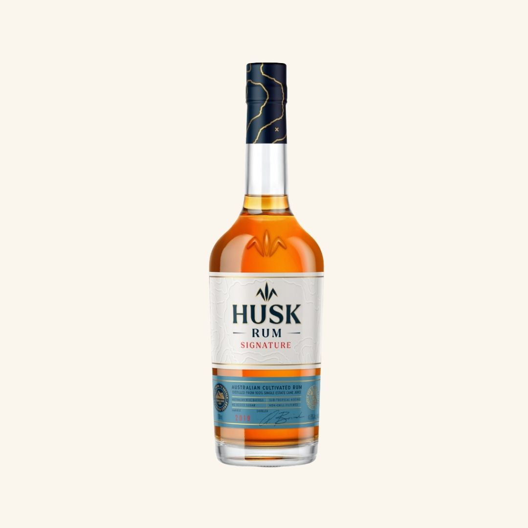 Husk Rum bottle with signature branding on a white background