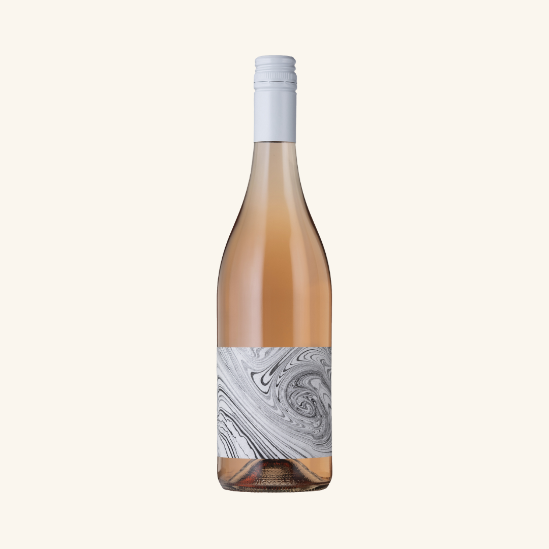 A bottle of in praise of shadows Sakura Rosé wine with a label featuring a marbled pink and white design.