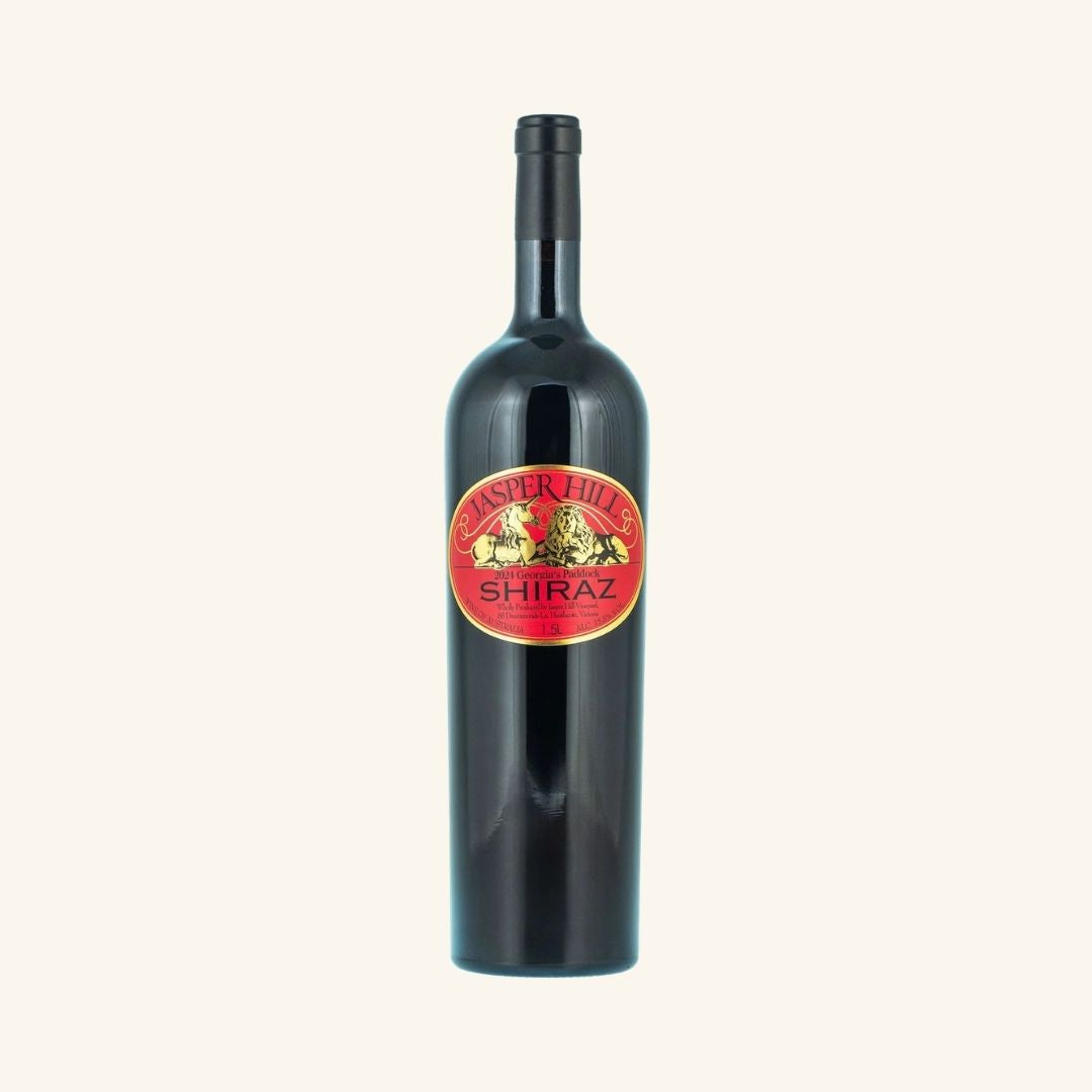 Wine bottle with a red label branded jasper hill shiraz on a white background