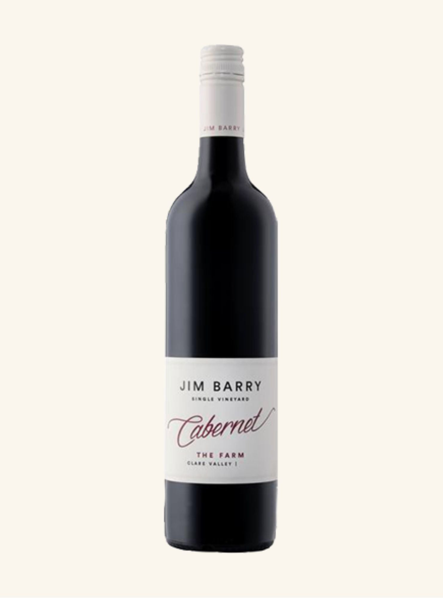 Red wine bottle with 'Jim Barry cabernet the farm' label on a white background