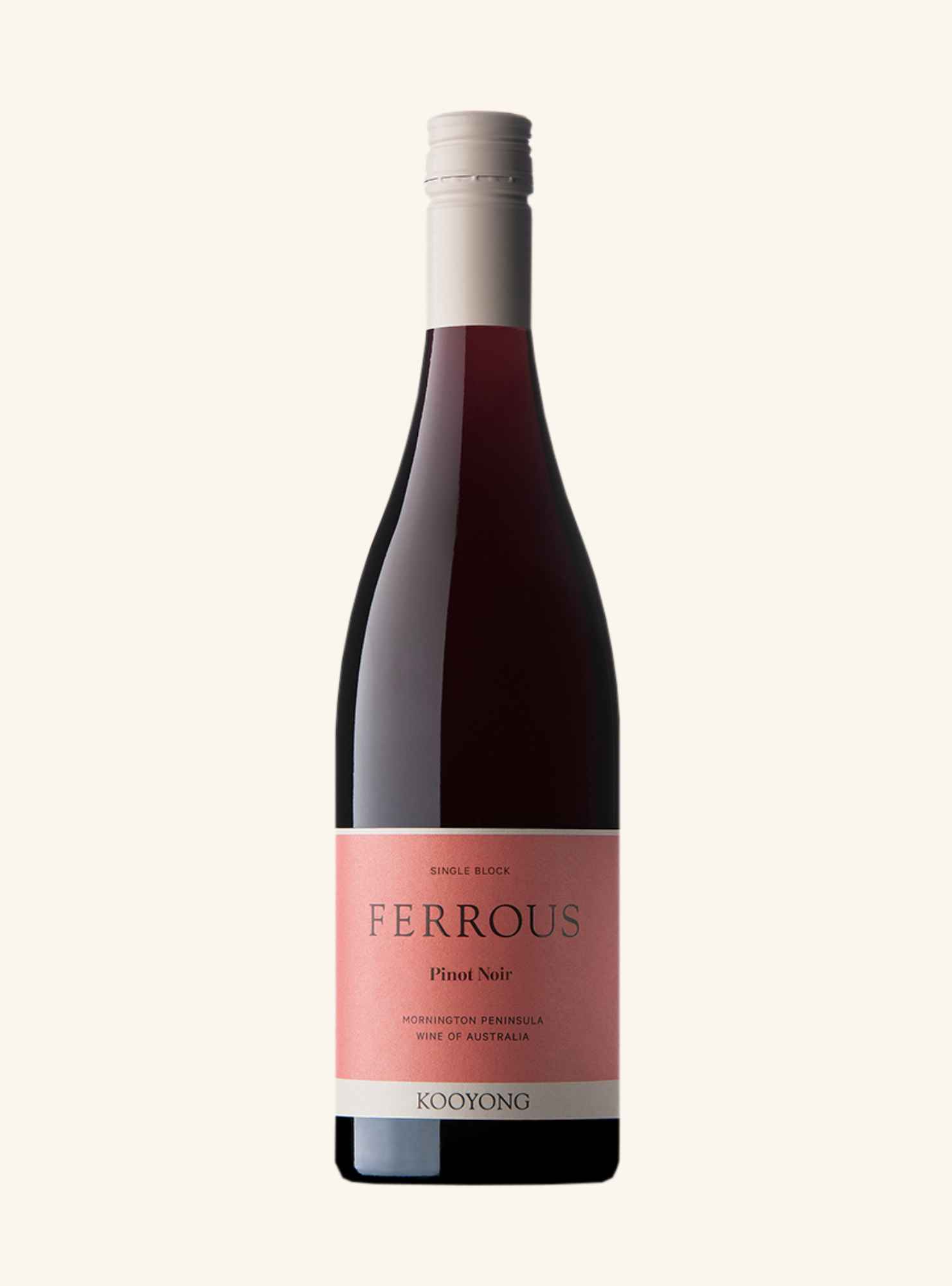 A bottle of Kooyong Ferrous Pinot Noir single batch red wine, featuring a dark glass bottle with a light pink label and a white capsule, set against a solid off-white background.