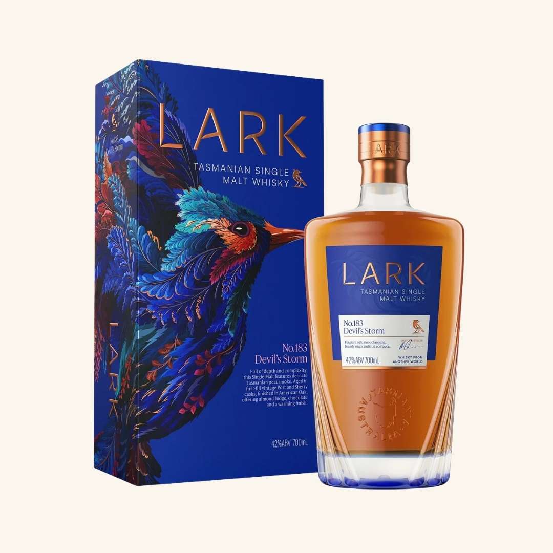 Lark Tasmanian single malt whisky bottle and box with a colorful bird design on the box.