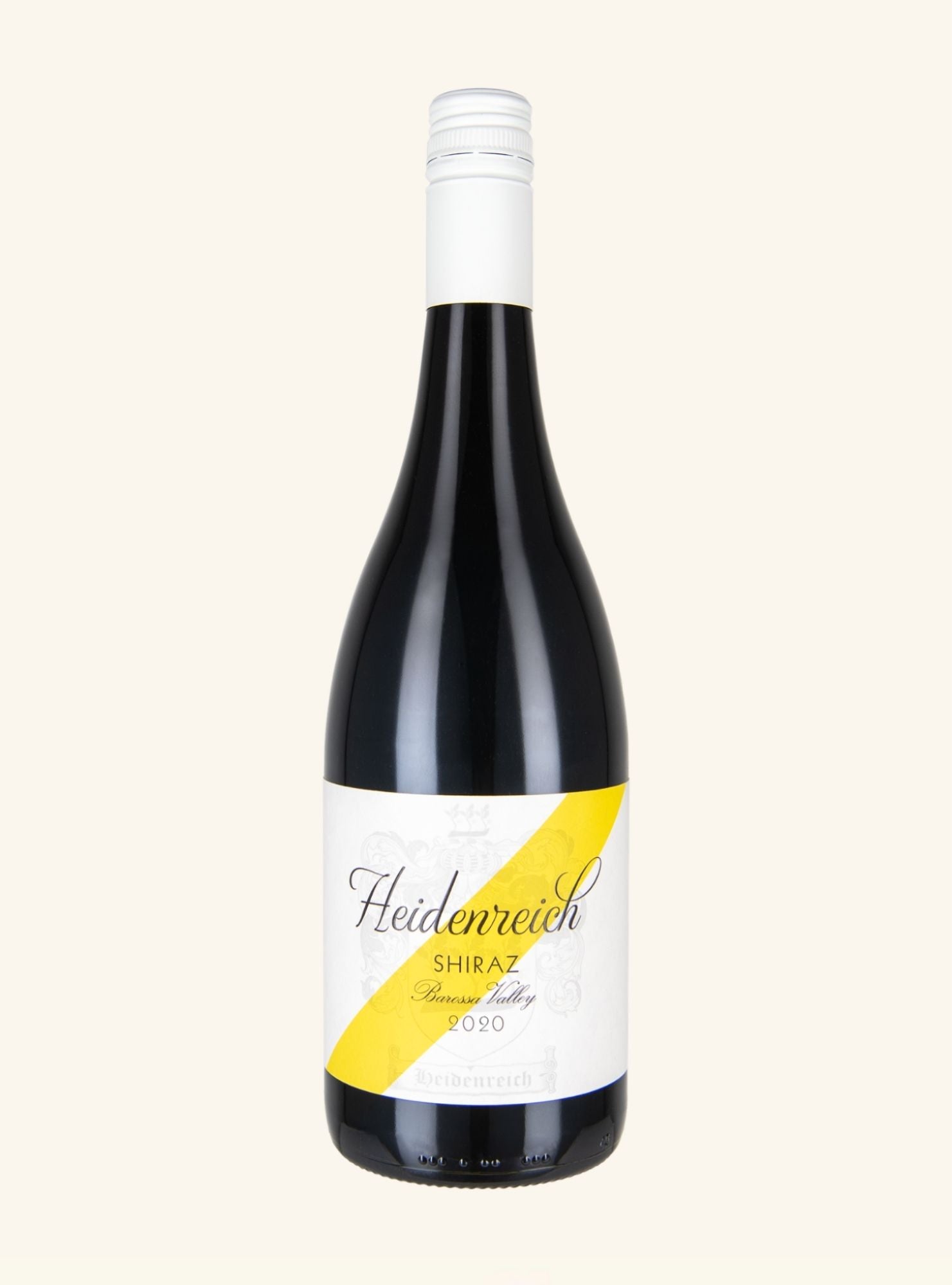 A bottle of Heidenreich Shiraz from the Barossa Valley 2020, featuring a dark glass bottle with a white and yellow label, set against a solid cream background.