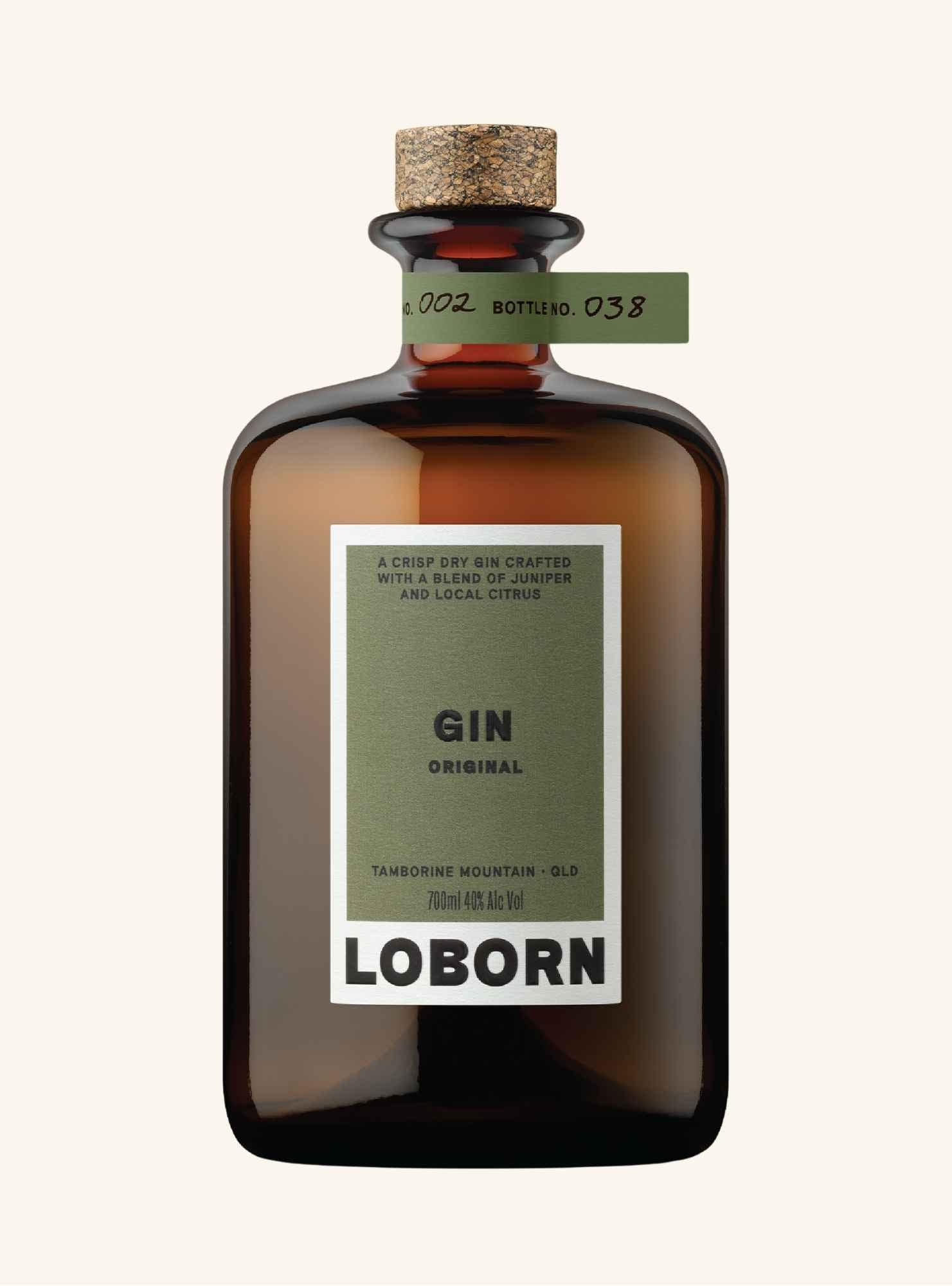 Bottle of Loborn Gin with a cork stopper on a white background